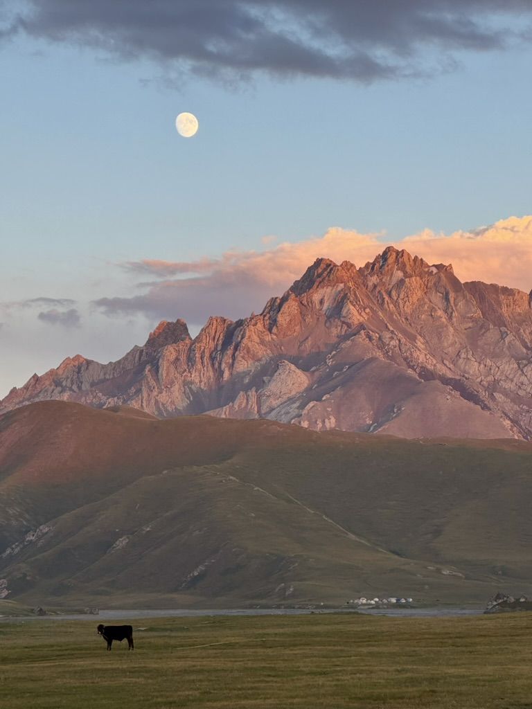 Moonrise over the mountains near Kel-Suu Lake, Kyrgyzstan